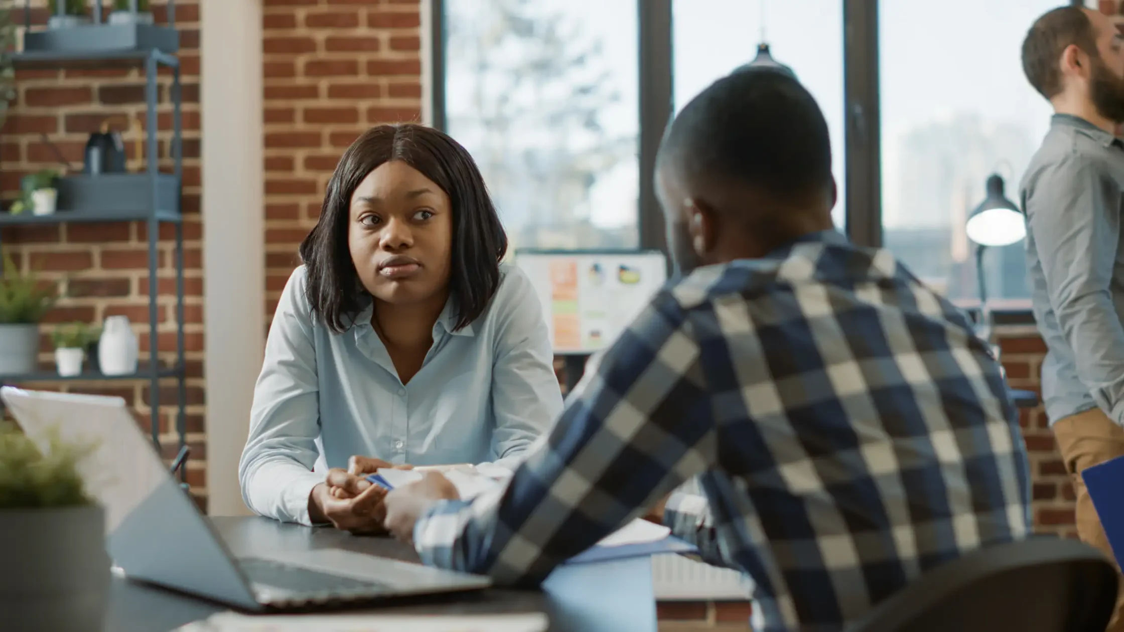 african american man woman attendng job interview